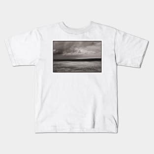 Light and darkness off the coast of the Mull of Galloway, Scotland. May 2021. Kids T-Shirt
